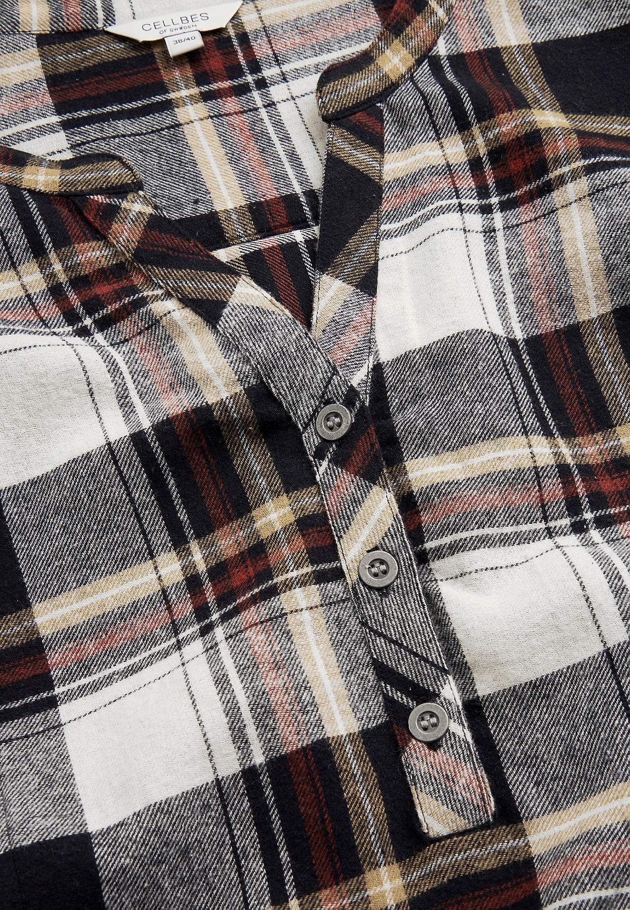 Taskutega flanellist tuunika