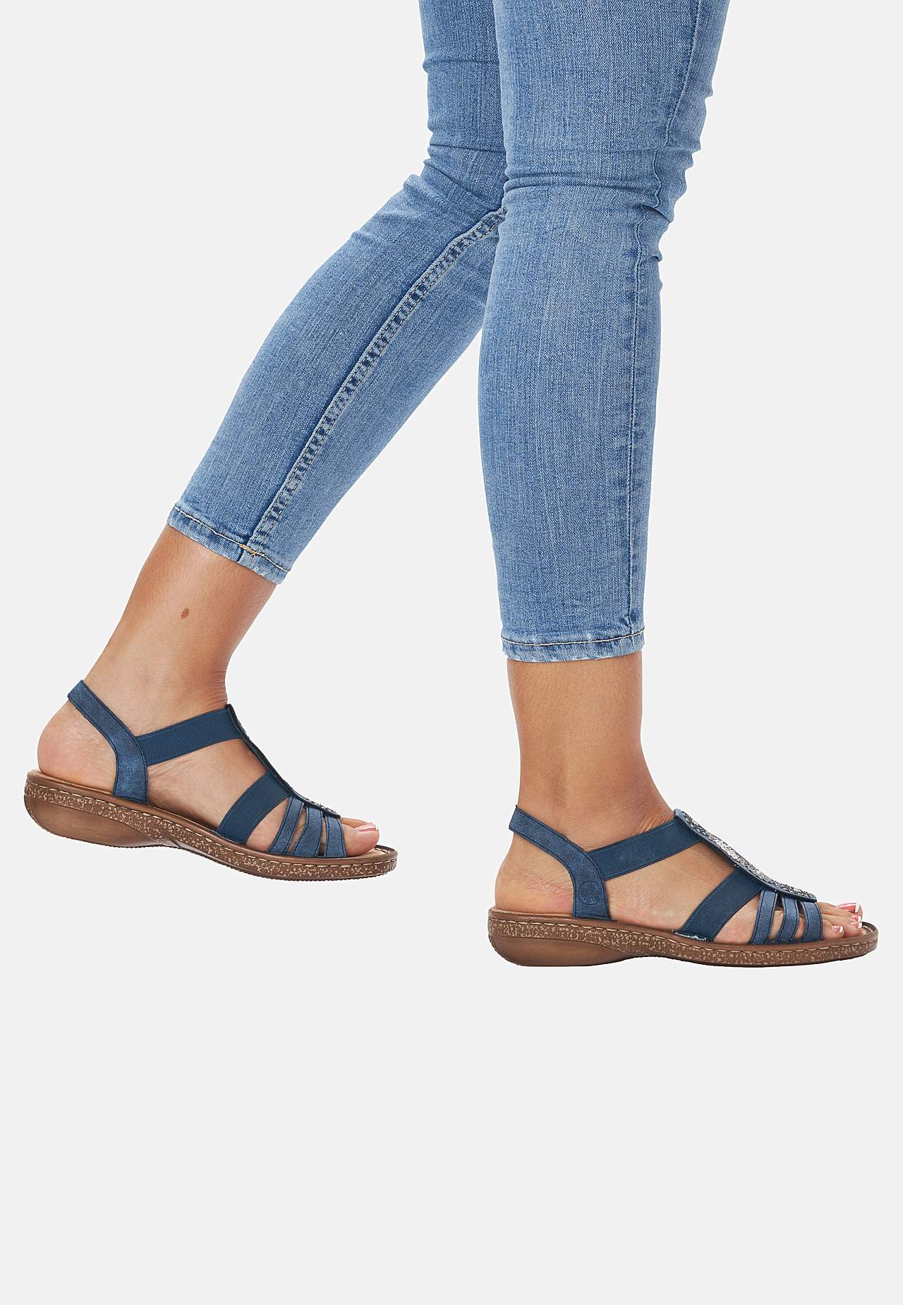 Rihmadega ja kaunite dekoratiivsete kivikestega sandaalid